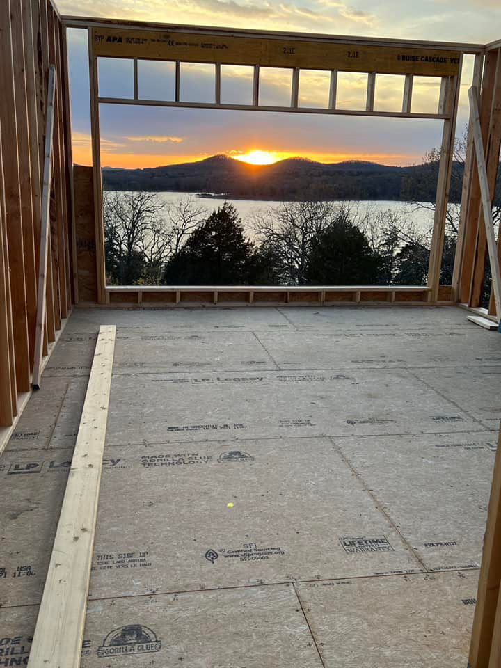 Interior wooden framing of a house under construction, showcasing work by Dove Construction and Remodeling in Springfield, MO.