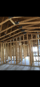 Interior house framing during a renovation project by Port City Remove and Improve in Wilmington, NC