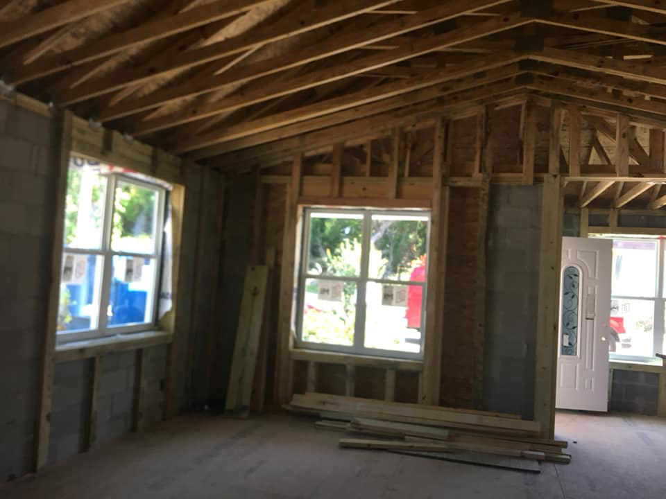 Interior house framing and newly installed windows during renovation by BA Services LLC in North Charleston, SC