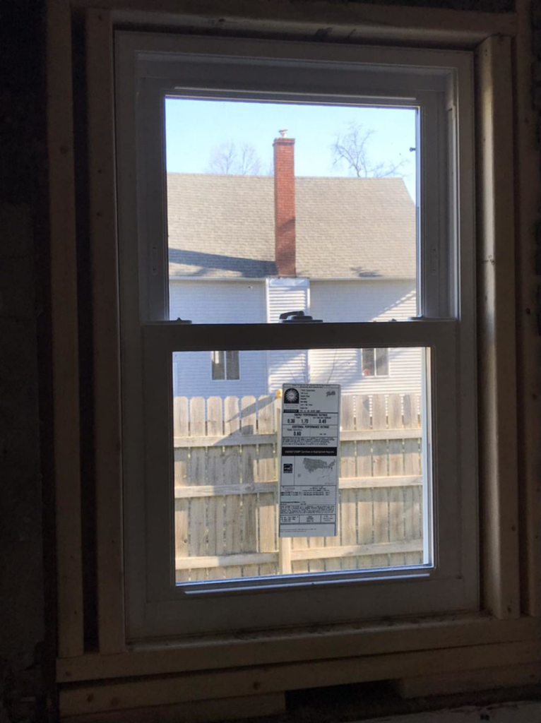 Interior view of a new window installation with wooden framing by Choice Contractors LLC in Fort Wayne, IN.