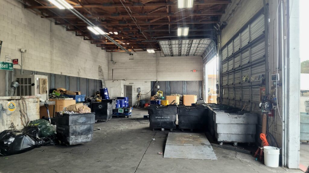 Interior processing area with various bins and materials at Nevada Recycling Henderson in Henderson, NV