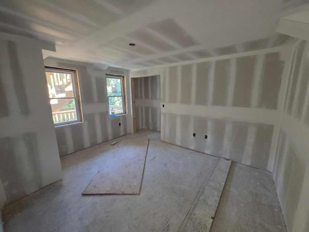 Interior room showing drywall finishing and remodeling work by J M Construction & Remodeling in Humble, TX.