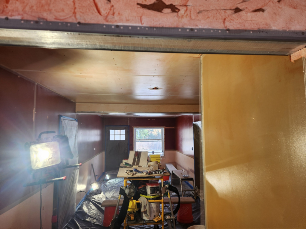 An interior room undergoing drywall and plastering preparation by Collins Plastering in Deland, FL