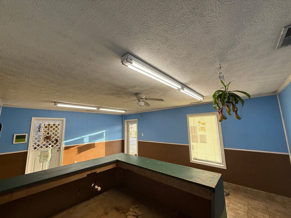 Interior room renovation showing painting, lighting, and counter work by Triple S Construction LLC in Hopkinsville, KY.