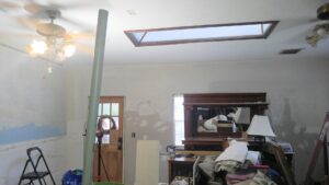 Interior room renovation with wall preparation and skylight visible by Wall Doctor's Plastering LLC in Tallahassee, FL