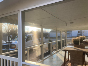 An interior view of a newly installed screened porch enclosure by HandyMan of NWA in Rogers, AR
