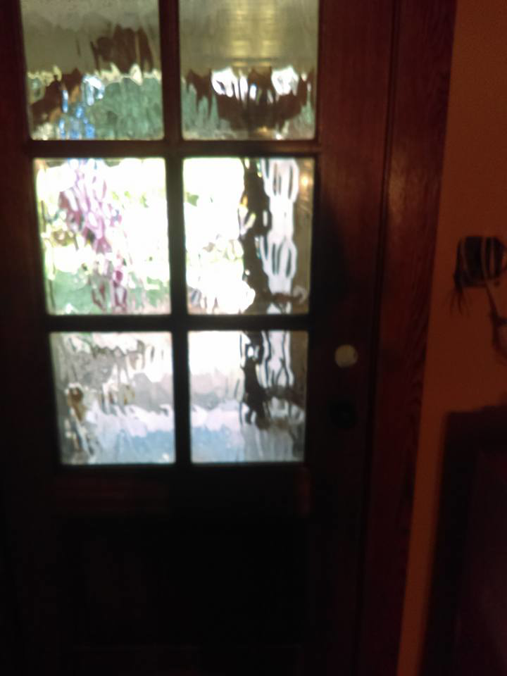 Interior view of a wooden door with decorative glass panels installed by Fryes Renovation and Improvements in Johnson City, TN.