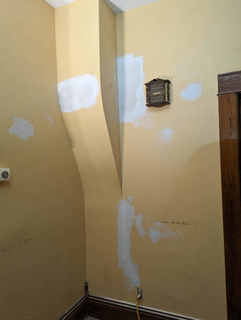 Interior walls with drywall patching and repair in progress by Friendly Handyman LLC in Wichita, KS