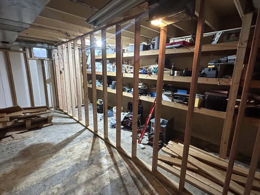 New interior wall framing in progress for a home improvement project by Pinnacle Roofing & Construction LLC in Elkhart, IN.