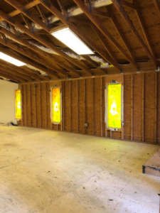 Interior view of a room with exposed wall framing during renovation by Rampro Construction in Rock Hill, SC