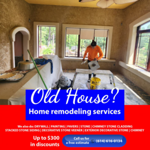 A handyman applying plaster to an interior wall for Cerrato Home Remodeling in Columbus, OH.