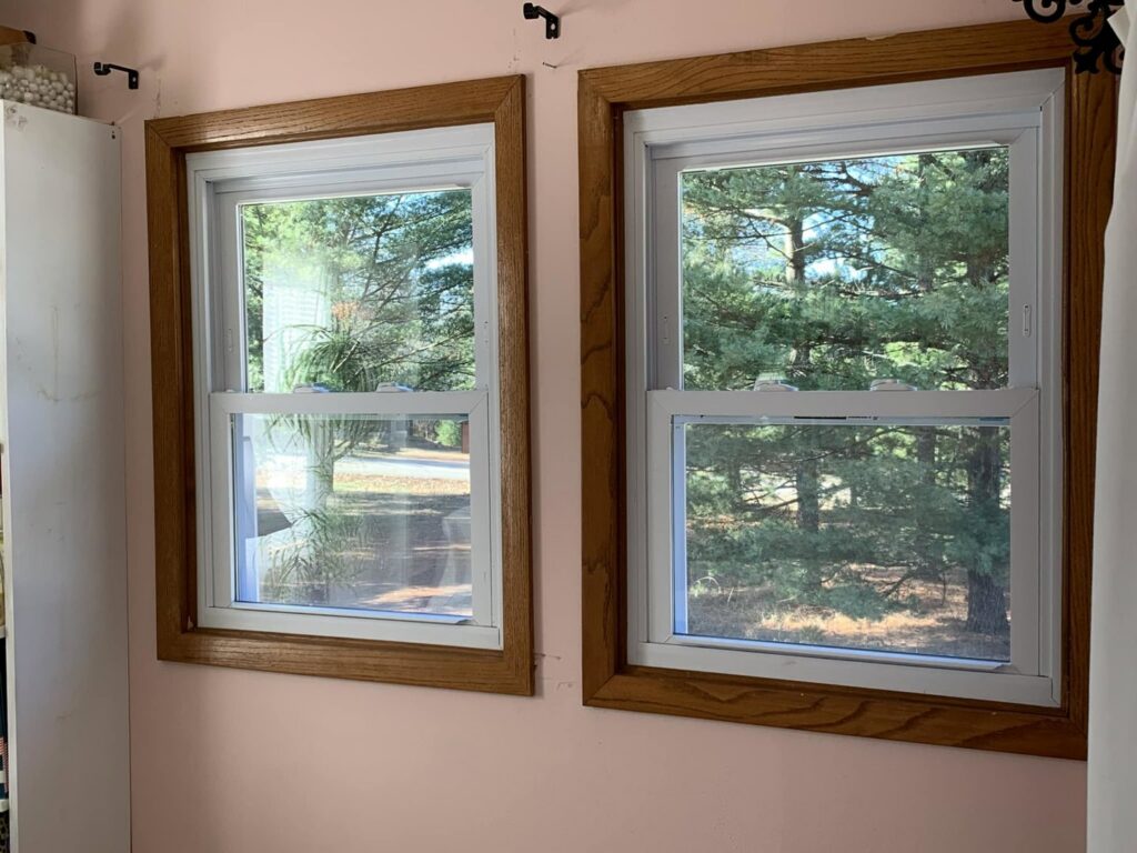 Two newly replaced interior windows with wooden frames by S-Squared Construction in Madison, WI.