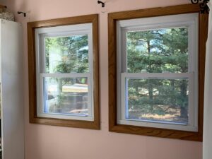 Two newly replaced interior windows with wooden frames by S-Squared Construction in Madison, WI.