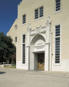 The ornate cast stone entrance of the Jane and John Justin Youth Building, a project by Dallas Cast Stone in Dallas, TX