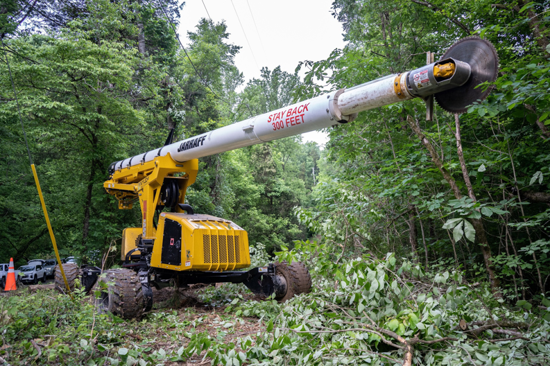 A Jarraff tree trimming machine clearing vegetation for Tree Care of New York in Alden, NY