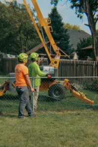 JOCO Services performing professional stump grinding with specialized equipment in Council Bluffs, IA.