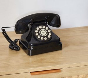 A junk hauling truck filled with various items from a residential property by Select Sanitation Inc. in Charlotte, NC.