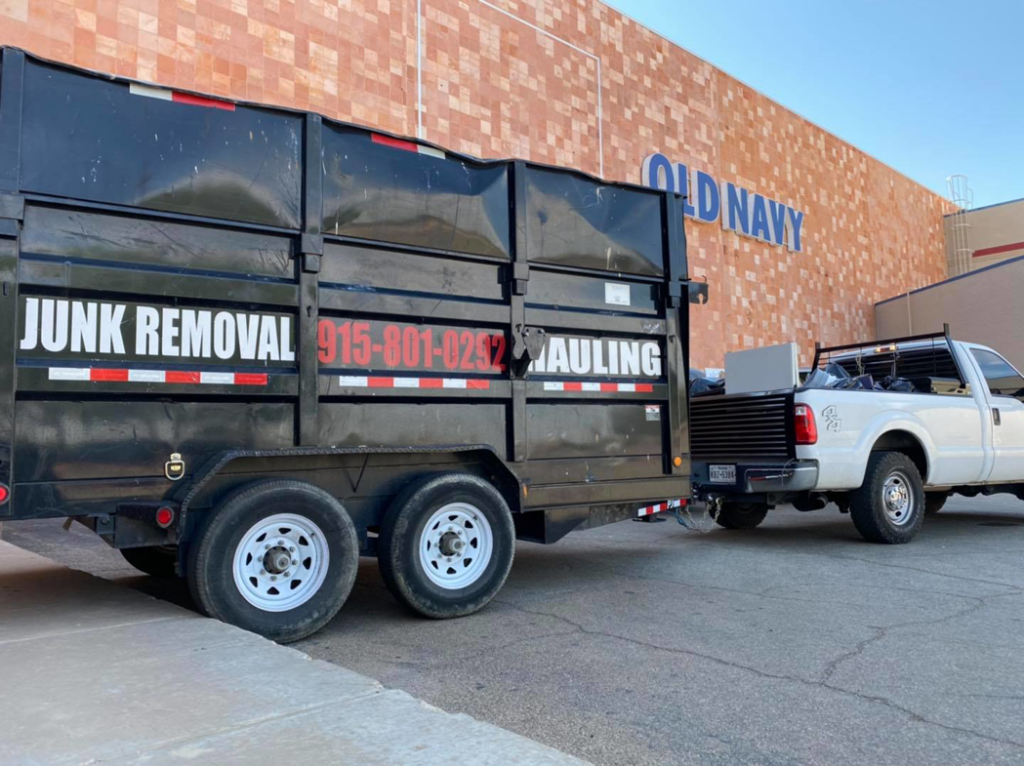 A branded junk removal trailer and truck from El Paso Junk Removal and Hauling, parked and ready for service in El Paso, TX.