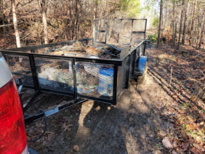 A trailer filled with various debris and junk items, ready for removal by Haulin' Junk Chattanooga in Chattanooga, TN.