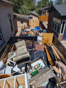 A Junk Free Solutions trailer completely full of household items and debris after a junk removal job in Reno, NV.