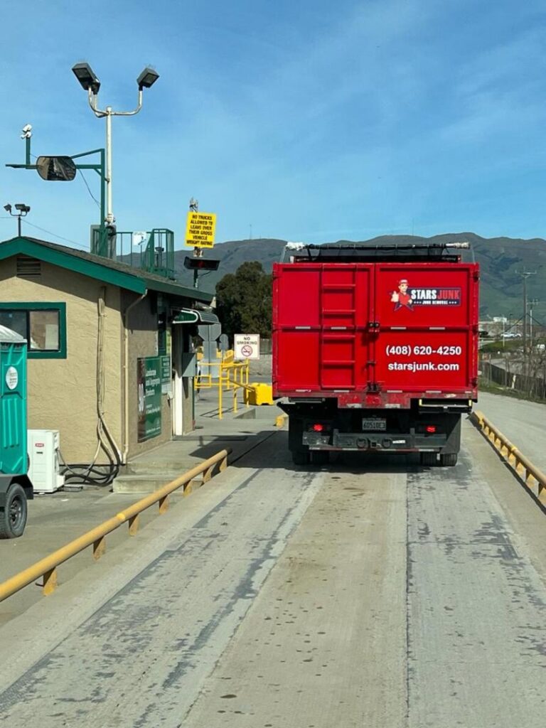 A Stars Junk Removal truck at a disposal facility, completing a junk removal job in San Jose, CA.