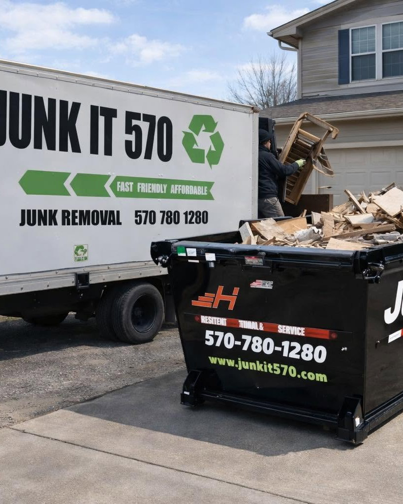 A JunkIt570 truck and a large dumpster filled with debris during a general junk removal job in Jessup, PA.