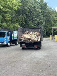 A Barkers Junk Removal & Hauling LLC truck filled with debris after a job in Roanoke, VA.