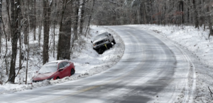 A junk removal truck fully loaded with debris at a residential property by Select Sanitation Inc. in Charlotte, NC.