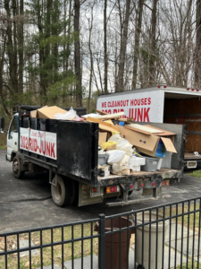 A 302-Rid-Junk truck loaded with debris and boxes after a successful junk removal job in Wilmington, DE.