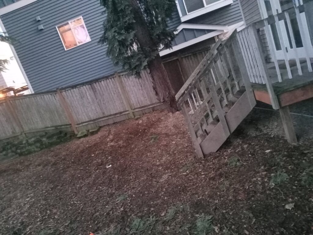 A junk removal truck loaded with various household items and debris, ready for transport by JUNK IN THEE TRUNK in Kent, WA.