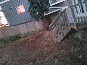 A junk removal truck loaded with various household items and debris, ready for transport by JUNK IN THEE TRUNK in Kent, WA.