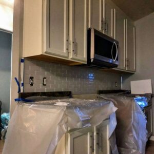 Kitchen cabinet and subway tile backsplash installation by Wall Doctor's Plastering LLC in Tallahassee, FL