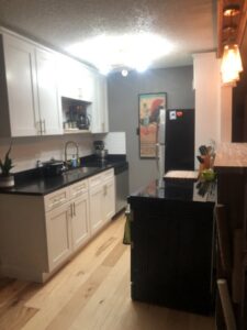 New kitchen cabinets and countertops installed by Denver House Repair in Lakewood, CO.