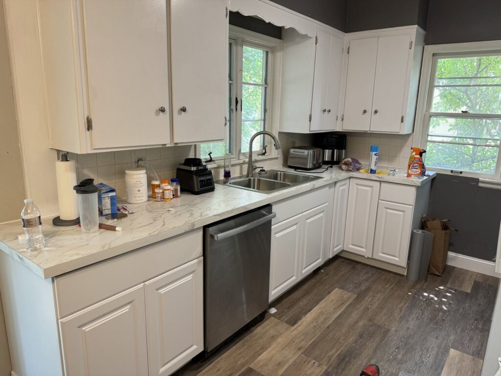 Kitchen renovation featuring new cabinets, countertops, and sink by Midwest Handyman LLC in West Fargo, ND.