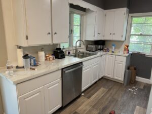 Kitchen renovation featuring new cabinets, countertops, and sink by Midwest Handyman LLC in West Fargo, ND.