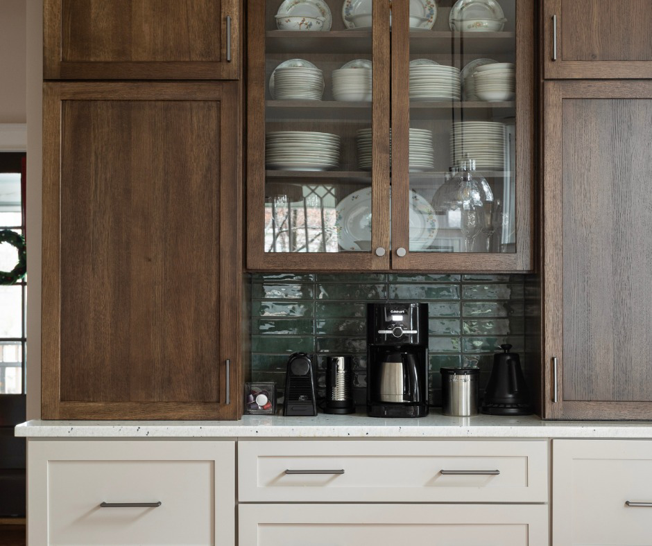 Custom kitchen cabinet installation featuring dark wood and light lower cabinets by Artisan Build Construct in Nashville, TN.