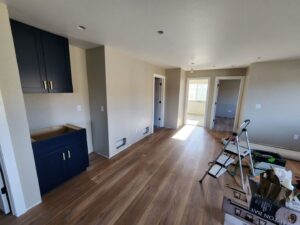 New kitchen cabinets being installed during a home renovation project by Vander Wal Contracting, LLC in Bismarck, ND