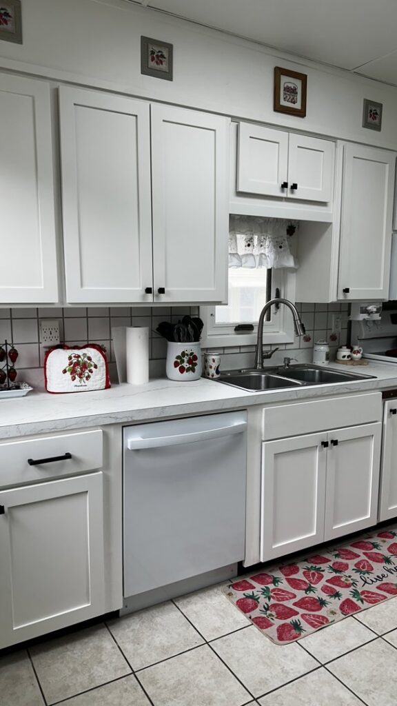 Newly installed white kitchen cabinets by Renegade Woodworks, enhancing a home in Kearney, NE.