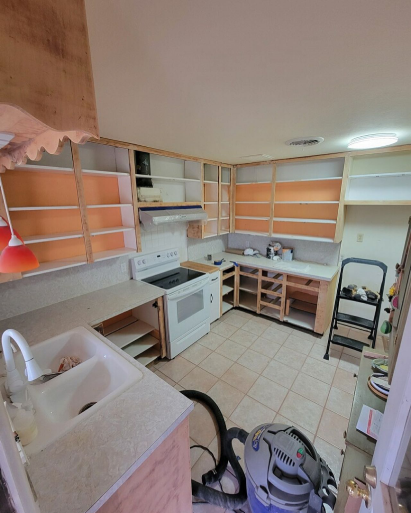 A kitchen undergoing cabinet installation and renovation, demonstrating handyman services by TnT Repair Services in Alamogordo, NM.