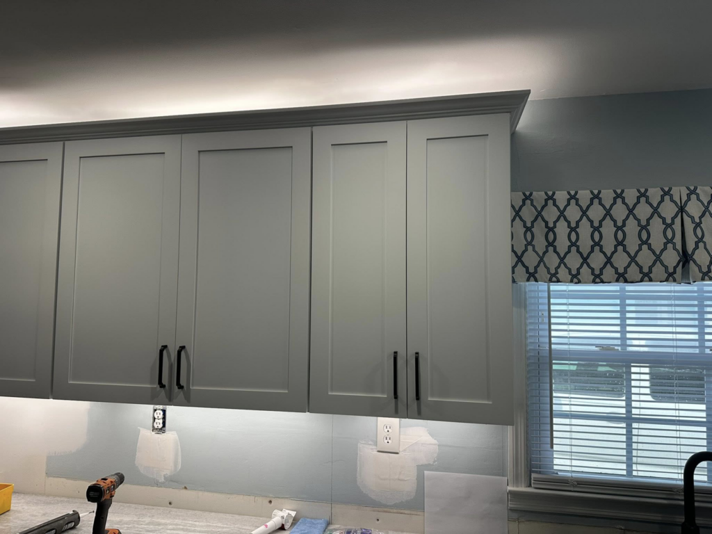 Newly installed kitchen cabinets and under-cabinet lighting by W. Brian Roberts Construction in Wilmington, NC