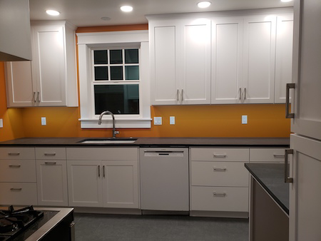 Professional kitchen cabinet, sink, and dishwasher installation by Girard Builders in Medford, OR.