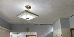 An unfinished kitchen ceiling corner before trim installation by Blackbird Custom Carpentry in Kansas City, MO.