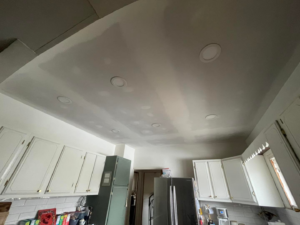 Newly installed drywall and recessed lighting on a kitchen ceiling by JayBird Handyman Services in Benson, AZ
