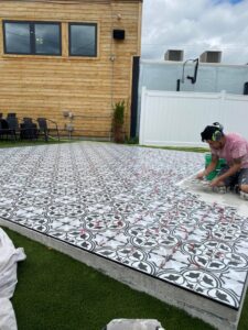 A renovated kitchen featuring new countertops and a stylish backsplash by CSR Tile Construction LLC in Minneapolis, MN.