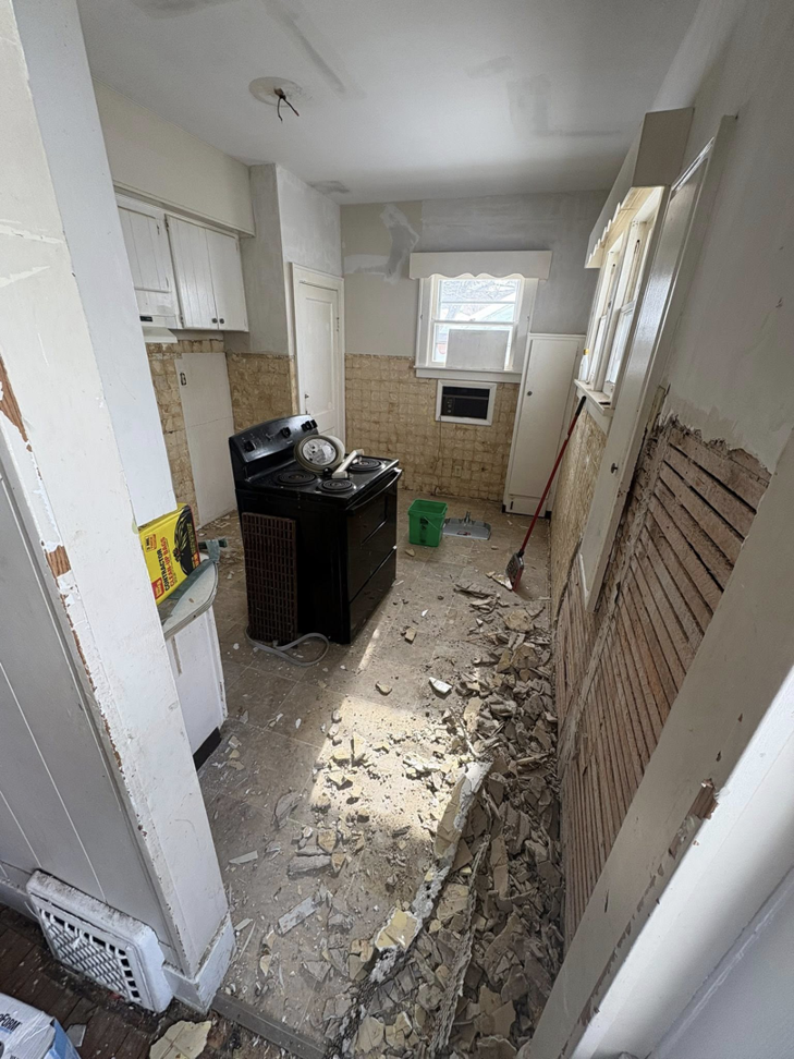 A kitchen undergoing demolition and renovation by John Oliver Rose & Co. in South Bend, IN