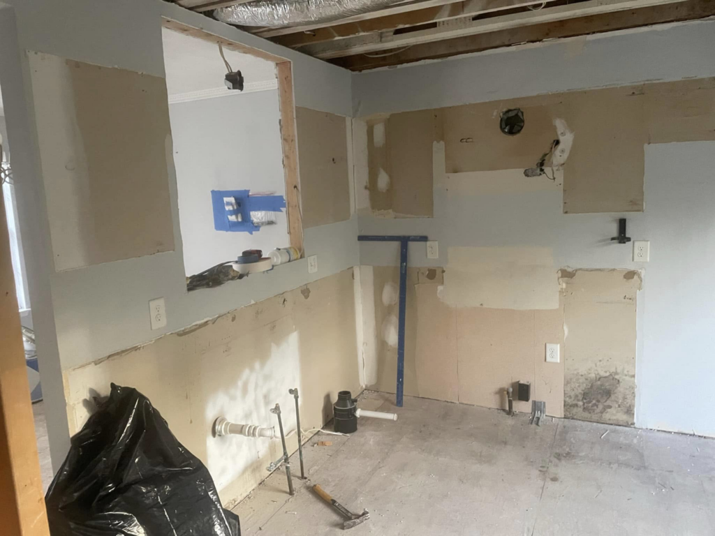 Kitchen demolition and rough-in phase of a renovation project by Wise Construction Group in Atlanta, GA.