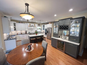 Kitchen and dining area renovation with white and grey cabinets by Berco Construction LLC in Godfrey, IL