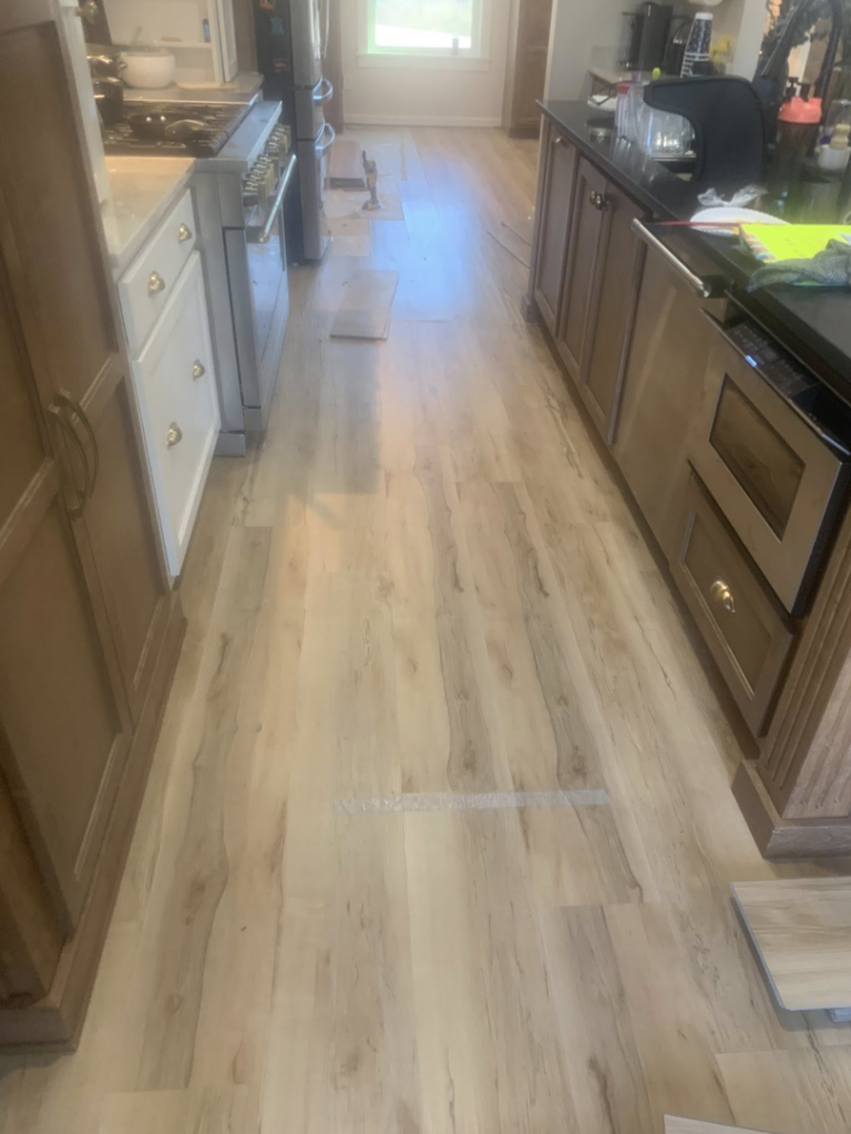 New kitchen flooring installation by KMK Construction & Remodeling in Southaven, MS.