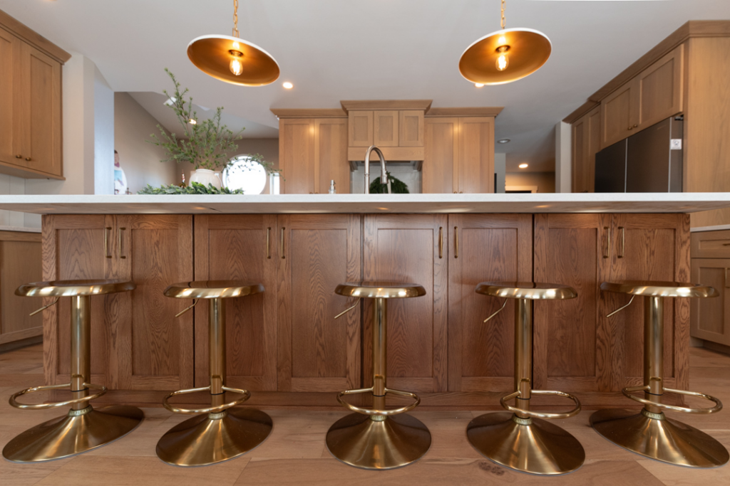 Kitchen island with new cabinetry and countertop installed by Becker Home Improvement, Inc. in Cottage Grove, WI.