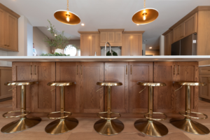 Kitchen island with new cabinetry and countertop installed by Becker Home Improvement, Inc. in Cottage Grove, WI.